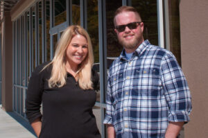 rue21 Cornelia Store Manager Jenna Tetreault and District Manager Joe Carroll outside the new store in Cornelia.