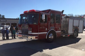 The Cornelia Fire Department added sirens and bright red to the festive occasion.