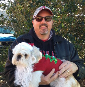 Gizmo got all decked out to see Santa and his sisters in the parade.