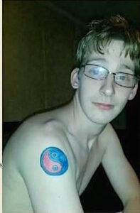 Turpin has a red and blue yin and yang tattoo on his right shoulder.