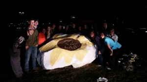 16 students painted 'The Rock' on the HCHS school campus in a show of support for their injured classmate.