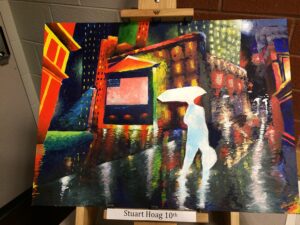 Pieces such as this beautiful city scene created by Stuart Hoag were presented in the main lobby Monday evening for Fine Arts Night.