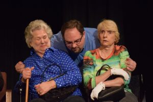 Lynda Smith (Maude), Justin Dudkiewicz (Lawrence Fink, Jr.) and Alta Moseley (Myrtle) in a scene from "A Biddy Full Day".