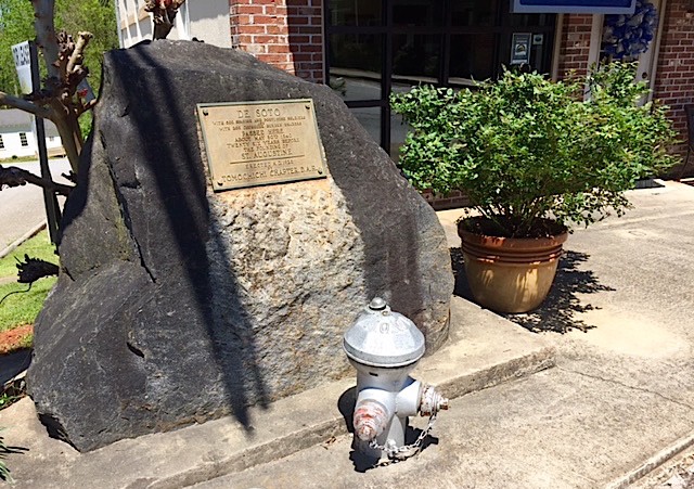 Surrounded by signs of modern life, the marker points to a time 278 years before Habersham County existed.