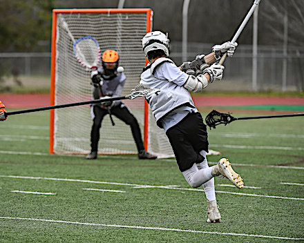 Young athletes making amazing plays while playing Lacrosse