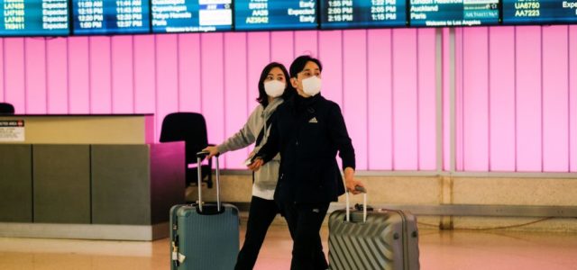 Passengers arrive at LAX from Shanghai, China