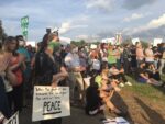 People take a stand – and a knee – during peaceful protest in Clarkesville