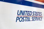 Under pressure, postmaster general says he will delay cuts till after election