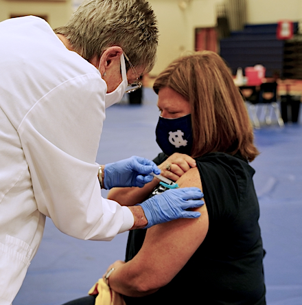 Dr. Burkett getting COVID shot