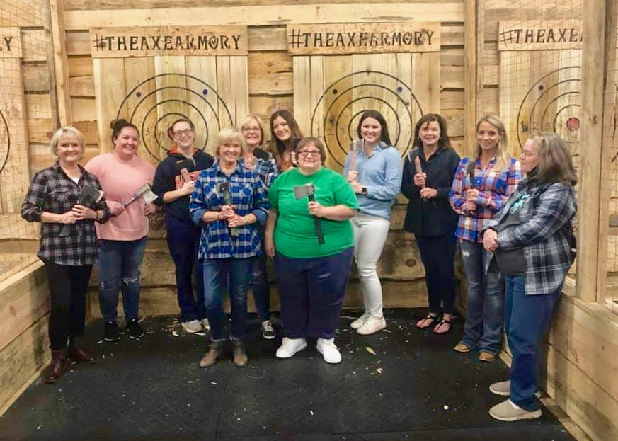 Women axe throwing