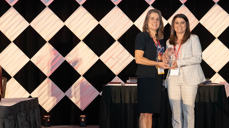 Jesse Gibson Receiving Award