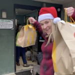 Shelter volunteer delivers K9 Christmas treats