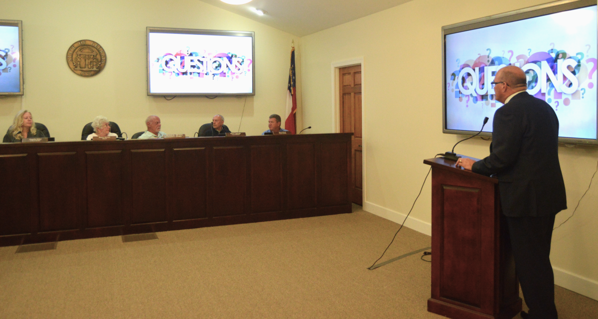 Keith answers questions during his budget presentation.