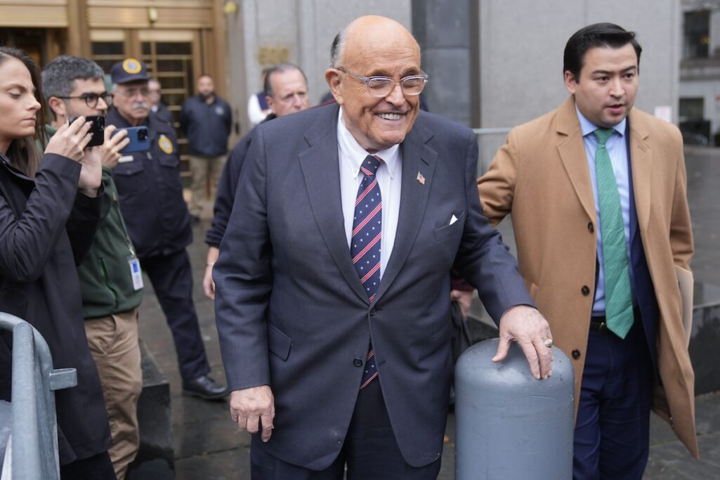 Rudy Giuliani draws rebuke for a courtroom outburst accusing judge in assets case of being unfair