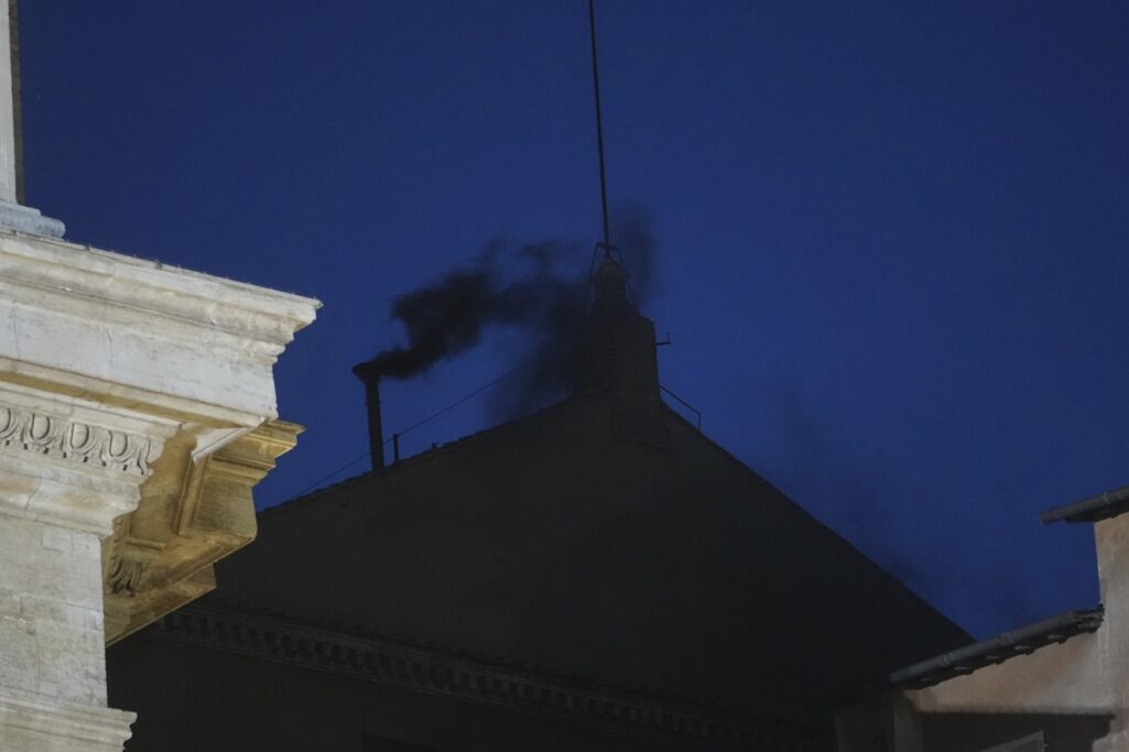 Black smoke pours from Sistine Chapel chimney, indicating no pope was elected as conclave opens