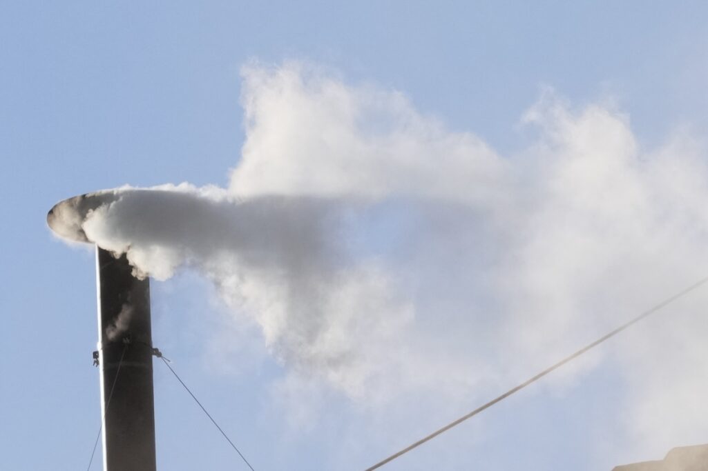 White smoke pours out of the Sistine Chapel chimney, signaling that a new pope has been elected
