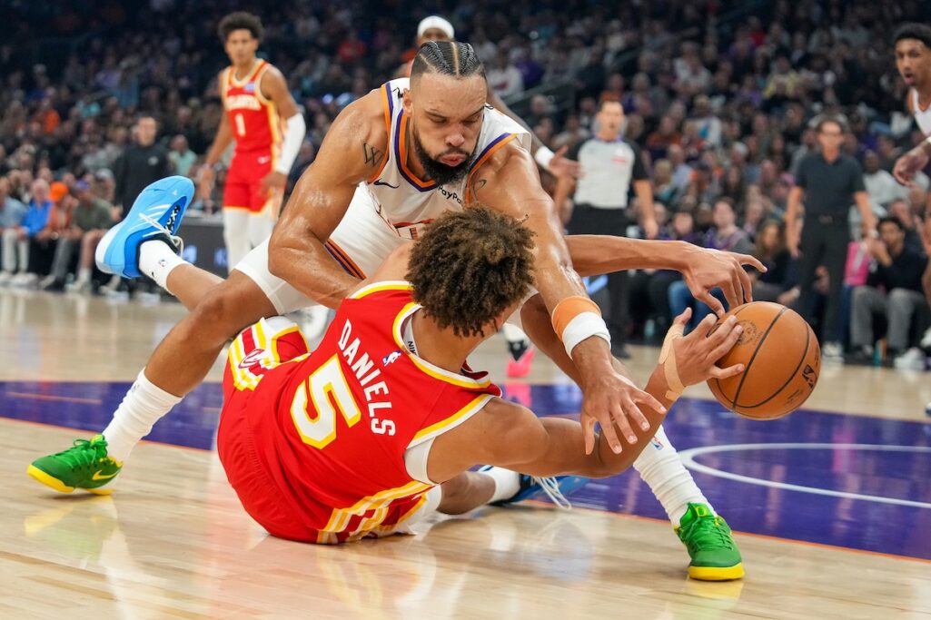 Hawks beat Suns 124-122 for 5th straight win