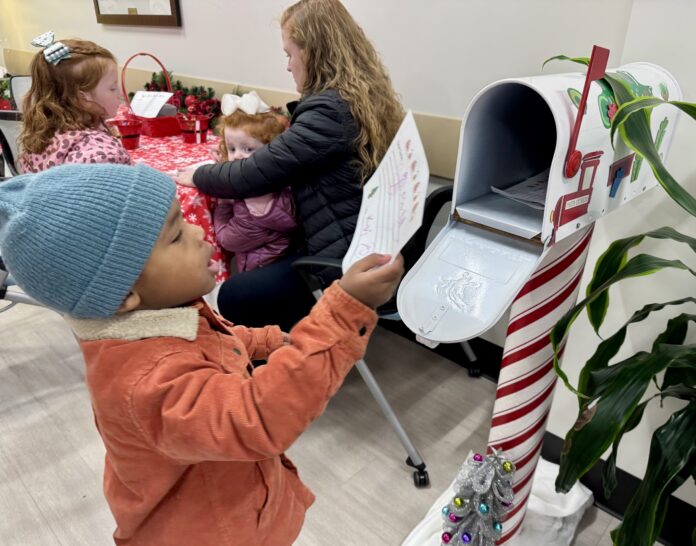 Piedmont child with Santa letter